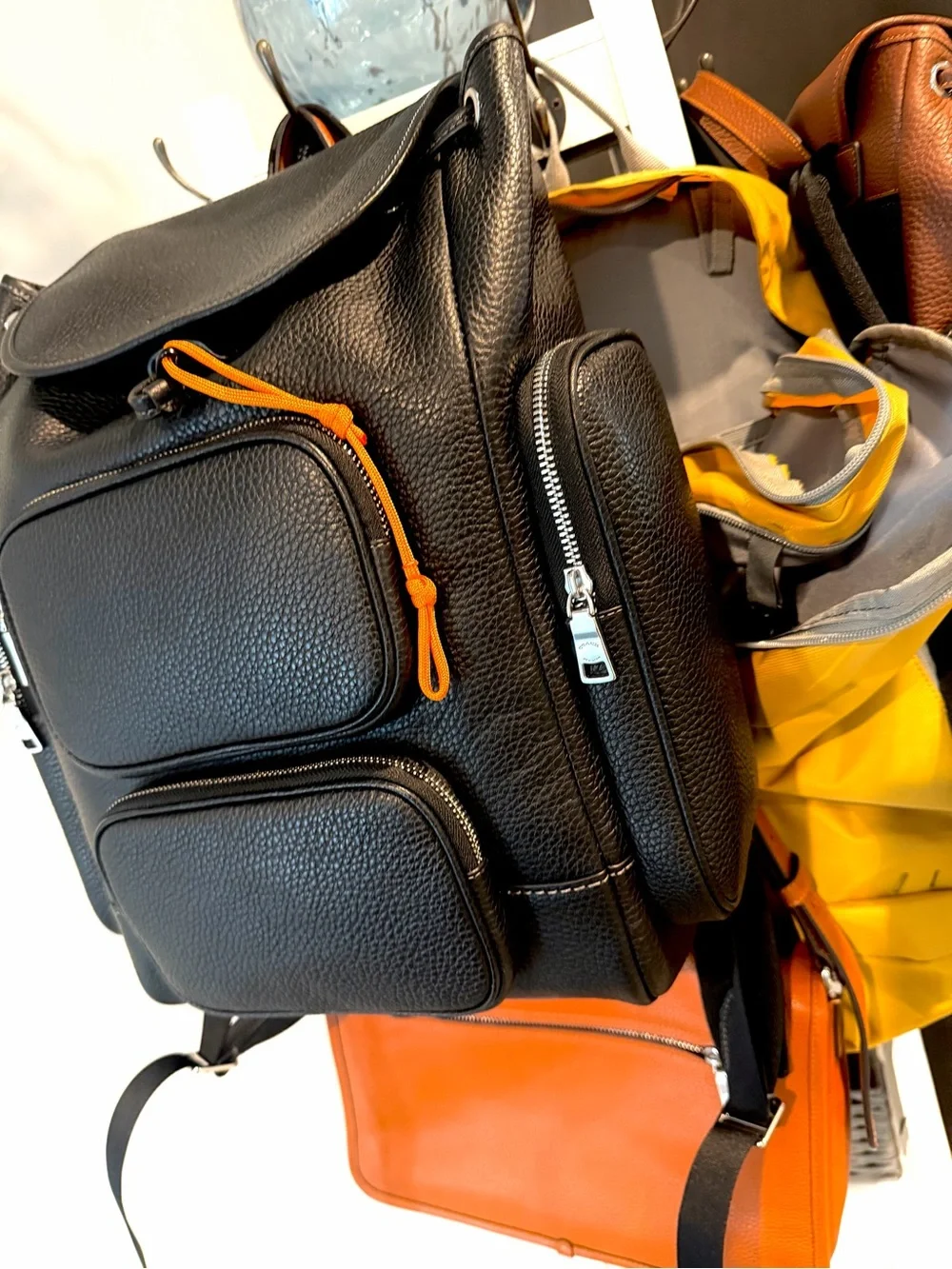 Coach Black Leather Backpack with Yellow Zip Pull